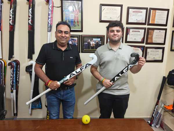 Jitin Mahajan (L) with Chaitanya Mahajan, the second and third generation hockey stick makers from Jalandhar. (Express Photo/Pritish Raj)