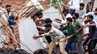 Rescue operation underway after a building collapsed near Satya Niketan at South-West Delhi, in New Delhi on Sunday. (ANI Video Grab)