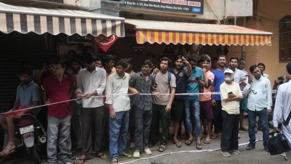 Chaos at Nearby PGs after building collapse incident in Delhi. (Express Photo by Abhinav Saha)