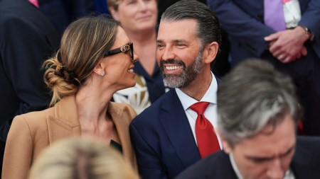 Donald Trump Jr, center, speaks with his wife Bettina, left, as they wait for US President Donald Trump to deliver remarks to US embassy staff at Deerfield Residence in Dublin. (AP FILE)