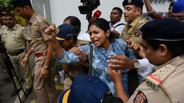 Heavy police security is deployed outside the main gate of IIT-B Powai campus, in Mumbai on 21 September 2026. Express photo by Sankhadeep Banerjee.