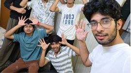Akshat Singh (in a teal T-shirt) and Arpit Jaj (in a striped T-shirt) with their friends at Navneet's birthday party at Hostel Daze