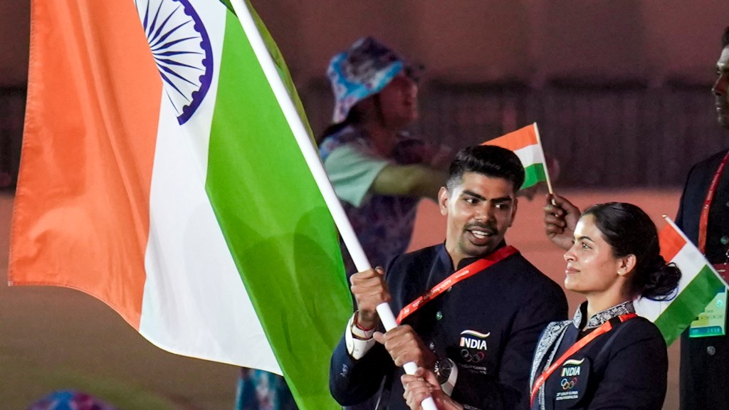 India's double Olympic medalist from Paris 2024 Manu Bhaker and kabaddi player Pawan Sehrawat lead the contingent at the athletes' parade, during the opening ceremony of the 20th Asian Games, in Nagoya, Japan, Saturday, Sept. 19, 2026. (PTI Photo)
