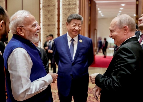 Prime Minister Narendra Modi with Russian President Vladimir Putin and Chinese President Xi Jinping on the sidelines of the 18th BRICS Summit, in New Delhi. PTI