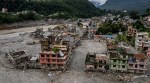A drone view shows a damaged residential building along the swollen Trishuli River in the aftermath of flash floods in Nepals Nuwakot district, Thursday, Sept. 3, 2026. (AP Photo)