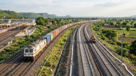 Vadodara-Ratlam railway lines will expand capacity on the Delhi-Mumbai route, allowing more passenger and freight trains to operate. (Image generated using AI)