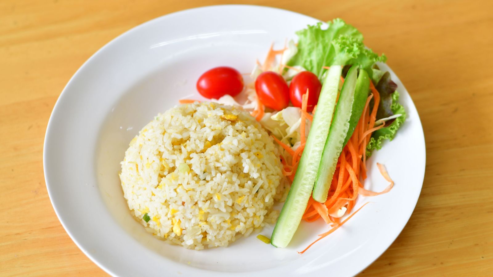 Experts recommend refrigerating cooked rice promptly and reheating only the portion you plan to eat.