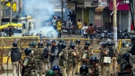Security personnel keep a vigil following stone-pelting incidents during protests against the proposed removal of a portion of the 'Shahi Masjid' for road widening