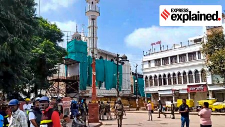 Security personnel keep vigil following stone-pelting incidents during protests against the proposed removal of a portion of the 'Shahi Masjid' for road widening, in Ujjain, Madhya Pradesh, Monday, Sept. 28. (PTI Photo)