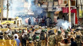 Security Personnel Use Tear Gas to Disperse Protesters in Ujjain