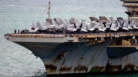 The US Navy aircraft carrier USS Abraham Lincoln arrives at the port in Laem Chabang, Chonburi, Thailand, Wednesday. (AP Photo)