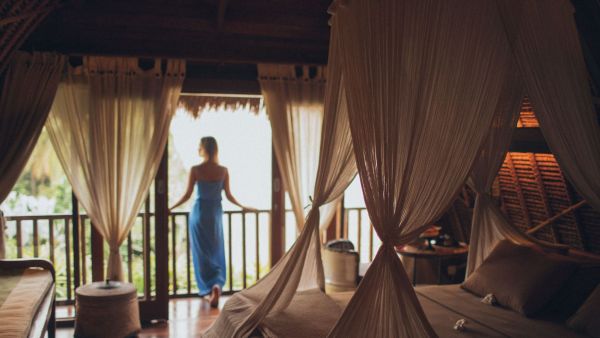 Experts say there is a difference between intentionally resting on holiday and using a hotel room to avoid experiences or social interaction.