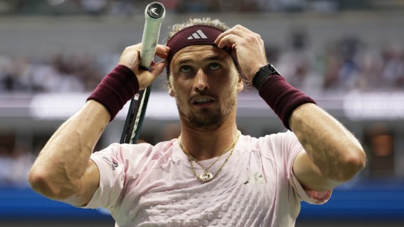 Alexander Zverev, of Germany, adjusts his headband as he competes against Ben Shelton, of the United States, during the men's singles final of the U.S. Open tennis championships Sunday, Sept. 13, 2026, in New York. (AP Photo)