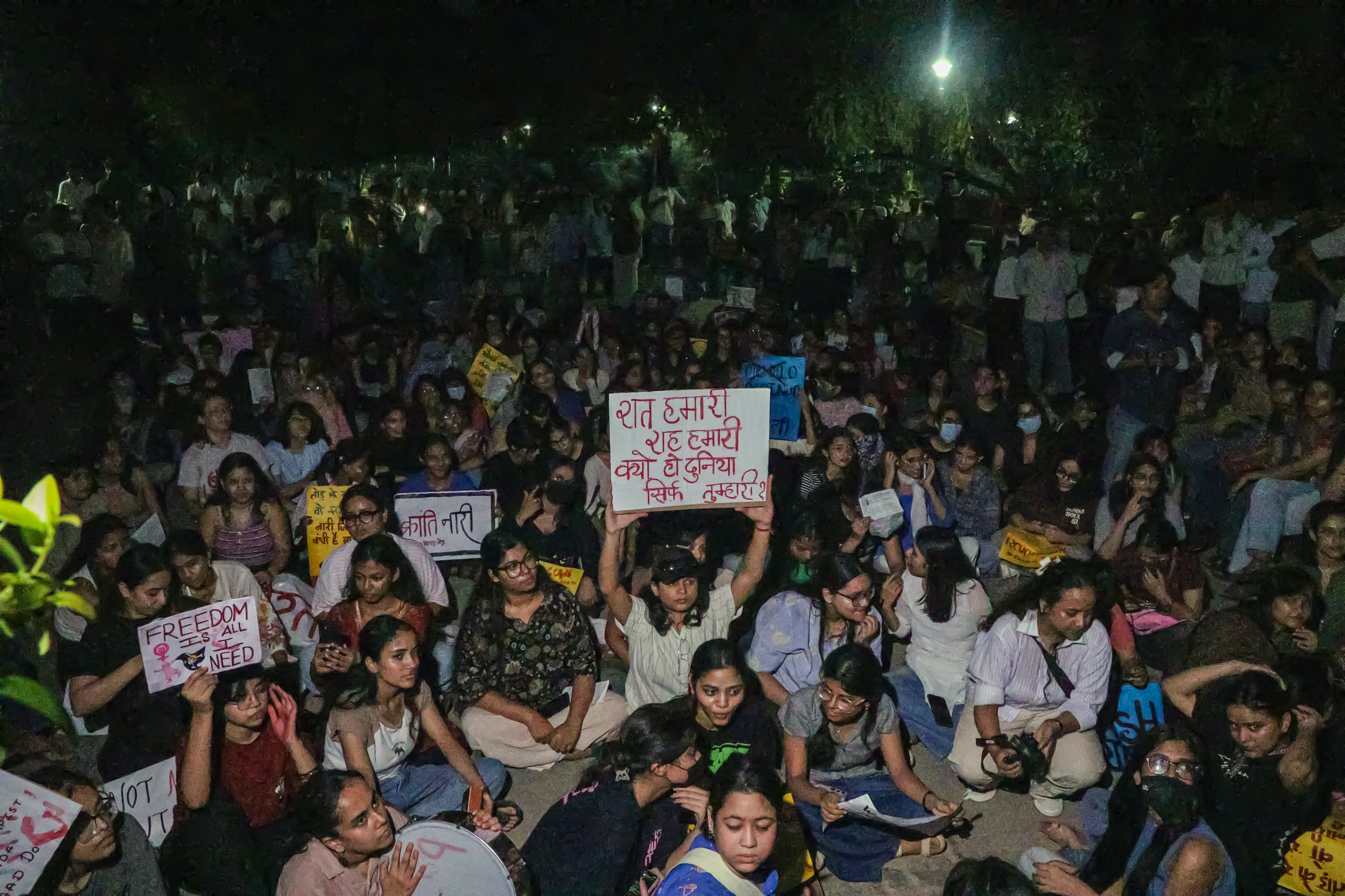 Members of the Disha Students' Organization hold placards and raise slogans during a 'Pinjratod' and 'Reclaim the Night' march from Vijay Nagar to Delhi University, in New Delhi on Wednesday. (ANI Photo)