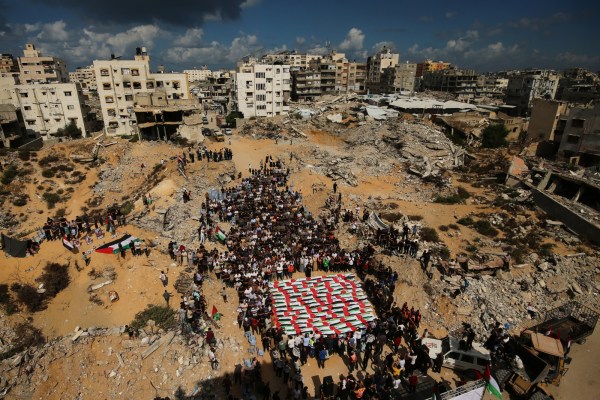A mass funeral for Palestinians, whose bodies were recovered from the rubble of buildings destroyed by Israeli airstrikes, on October 1.