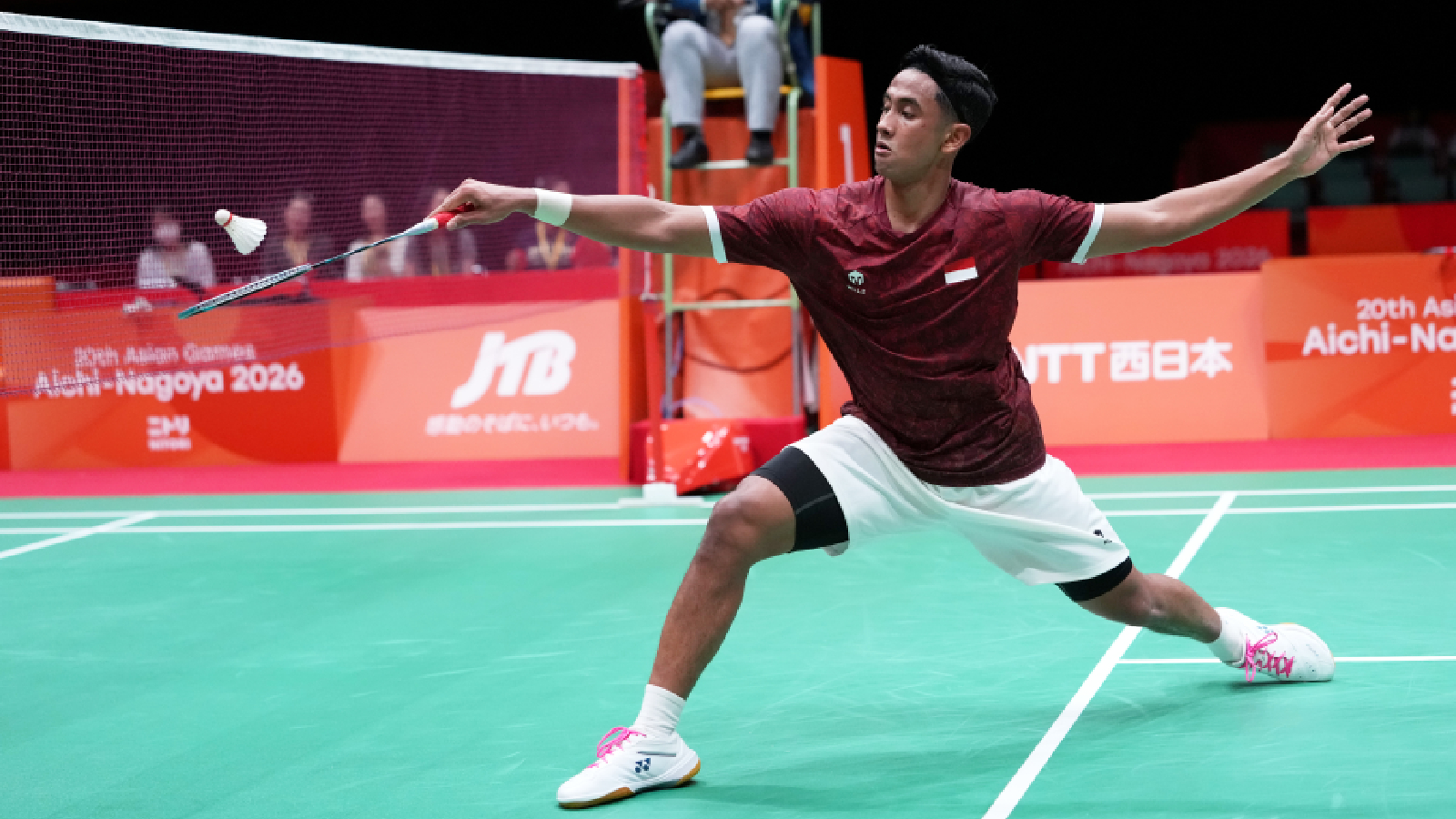 Indonesia's Alwi Farhan in action against China's Li Shifeng during the men's badminton team final at the Asian Games in Ichinomiya City, Japan, Thursday, Sept. 24, 2026.