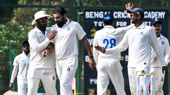 Bengal's Mohammed Shami celebrates with teammates after taking the wicket of Delhis Divij Mehra on day 4 of a Ranji Trophy 2026-27 cricket match between Bengal and Delhi, in Nadia, West Bengal, Wednesday, Oct. 14, 2026. (PTI Photo)