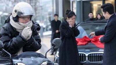 China restaurant owner gifts BMWs to employees