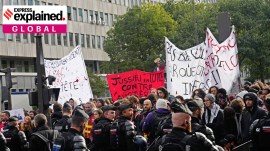 Protesters face police as they gather against poor education school conditions in Paris, Thursday, Oct. 22, 2026. (AP Photo/Teresa Suarez)