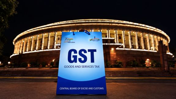 An illuminated Parliament ahead of midinight launch of 'Goods and Services Tax in New Delhi on Saturday. (File photo/AI enhanced)