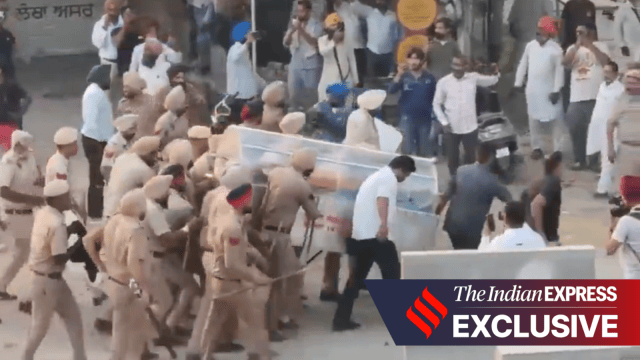 Police personnel carry away the body of Daljit Singh. (Video grab)