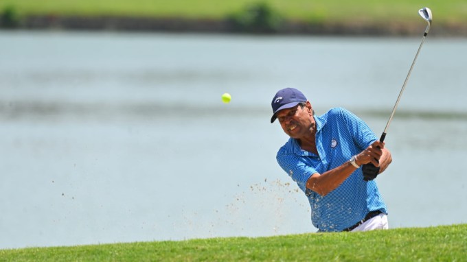 PGTI president Kapil Dev in action playing golf. (Special Arrangement)