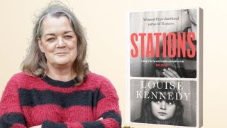 Irish author Louise Kennedy smiling during an interview about her novel Stations.