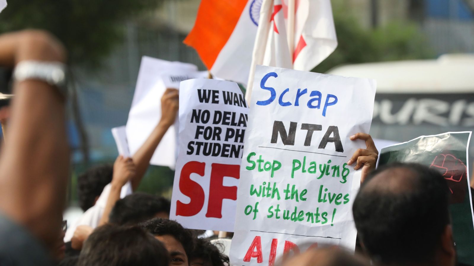 NEET Retest Faces Impersonation Arrest and Score Dispute in India