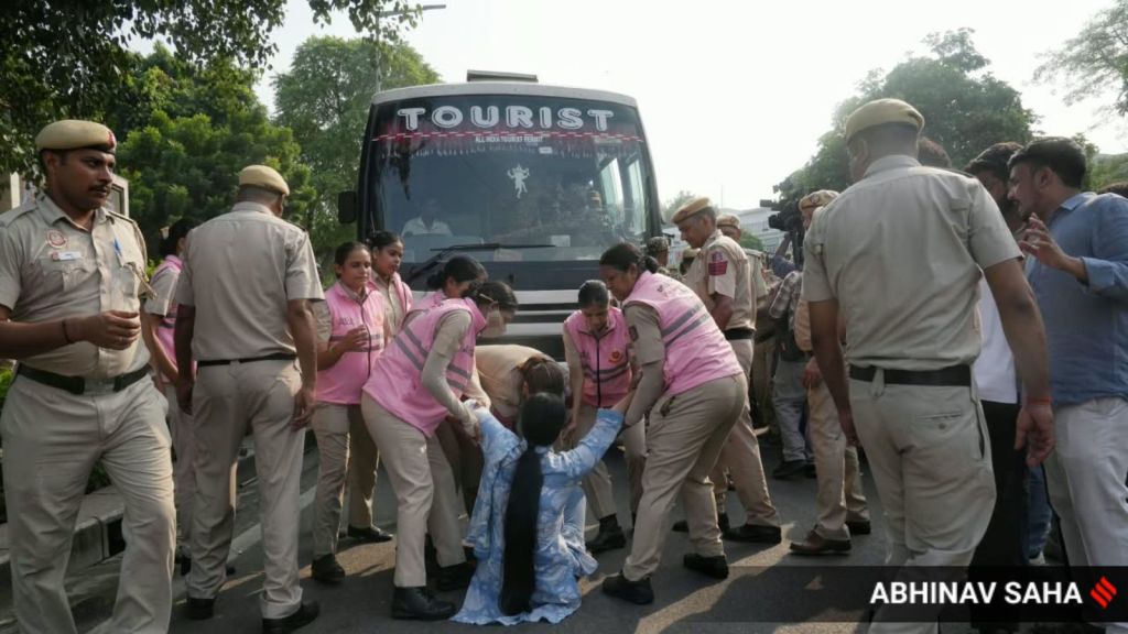 NSUI protesters detained at Connaught Place while protesting against the Elections Commission of India, Gyanesh Kumar, at New Delhi on Tuesday. (Express Photo by Abhinav Saha)