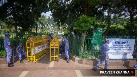 Security personnel keep a vigil ahead of the Cockroach Janta Party's proposed 'Lehra Do Tiranga' march at the Central Park in Connaught Place, in New Delhi