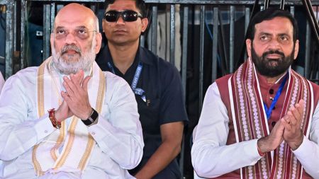 Union Home Minister Amit Shah with Haryana CM Nayab Saini during the 'Viksit Bharat Sankalp Sabha - Seva Jyoti Yatra', marking PM Narendra Modi's 25 years in public office, in Gurugram. (@NayabSainiBJP/X via PTI Photo)