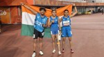 Champion Simran Sharma with her guide Shivam and bronze medallist Tejalben Damor in Women's 200m T12. (SAI Media)
