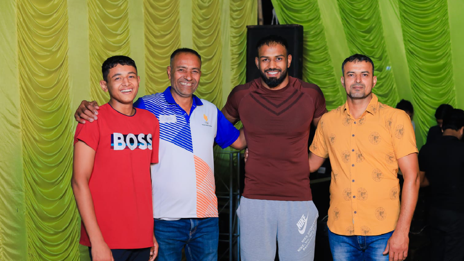 Nitesh Siwach with his father Anand Siwach (in blue) and uncle Naveen Siwach. Special arrangement