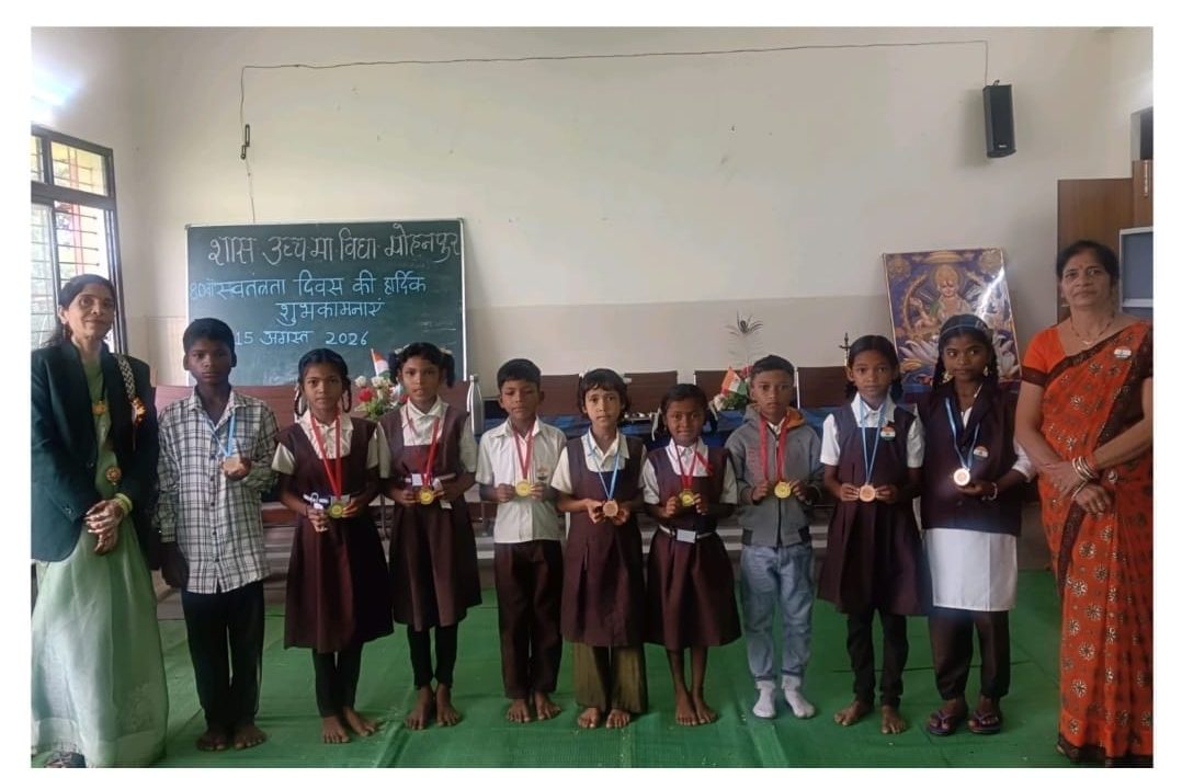 Sunita Pardi (left), Kajal’s teacher at her school in Mohanpur, with the children who had cracked a block-level Math Olympiad conducted by the state government. Kajal is standing third from left