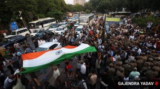 The CJP Tiranga Yatra (also known as the "Lehra Do Tiranga" march) is a protest call issued by Abhijeet Dipke, founder of the Cockroach Janta Party (CJP), at Connaught Place on Friday. (Express Photo by Gajendra Yadav)