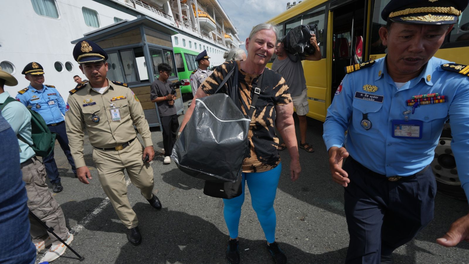 A passenger exits the MV Odyssey on Thursday (Photo: AP)