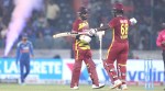 Shai Hope of West Indies celebrates after scoring a hundred during the 4th T20I match between India and West Indies at the Rajiv Gandhi International Stadium, Hyderabad, India on October 14, 2026. Windies