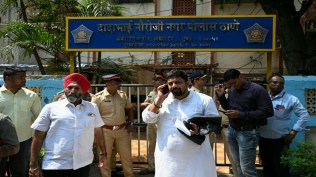 Ruben Mascarenhas, advocate to Tushar Gandhi, who is detained by police ahead of the protest at August Kranti Maidan, shows the vakalatnama to the media, at DN Nagar police station in Mumbai on 10 October 2026. Express photo by Sankhadeep Banerjee.