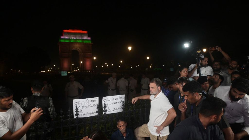 Lok Sabha LoP Rahul Gandhi joins the family of Ankita Bhandari during a sit-in protest at India Gate against BJP leader Dushyant Kumar Gautam's appointment as Sikkim Governor over his alleged involvement in the 2022 Ankita Bhandari murder case, in New Delhi on Wednesday. (ANI Photo)
