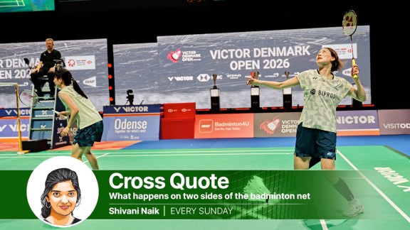 Japan's Sumire Nakade,left, covers the net as Miyu Takahashi plays a shot during a women's doubles quarterfinals match at the Denmark Open tournament. (AP Photo)