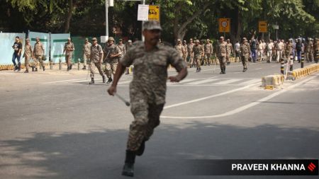Policemen detained Cockroach Janta Party supporters during demonstration demanding the resignation of the Election Commissioner Gyanesh Kumar near Bangla Sahib Gurudwara in New Delhi on Saturday.