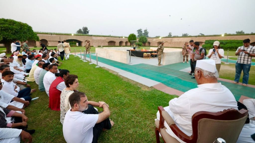 Rahul Gandhi and INDIA bloc MPs sit in silent protest at Raj Ghat over demands that CEC Gyanesh Kumar resign.
