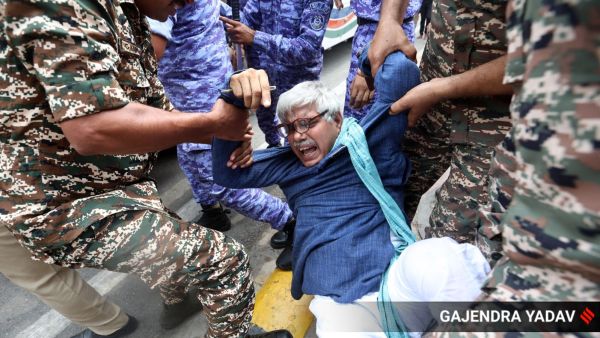 Police detain protesters during a demonstration demanding the resignation of the country's election chief Gyanesh Kumar, at Connaught Place in Delhi on Sunday, Express Photo by Gajendra Yadav.111026