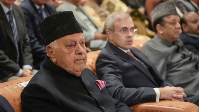 Jammu and Kashmir CM Omar Abdullah, JKNC chief Farooq Abdullah and others during the swearing-in ceremony of new cabinet ministers of union territory, in Srinagar, Tuesday, Oct. 27, 2026. (PTI