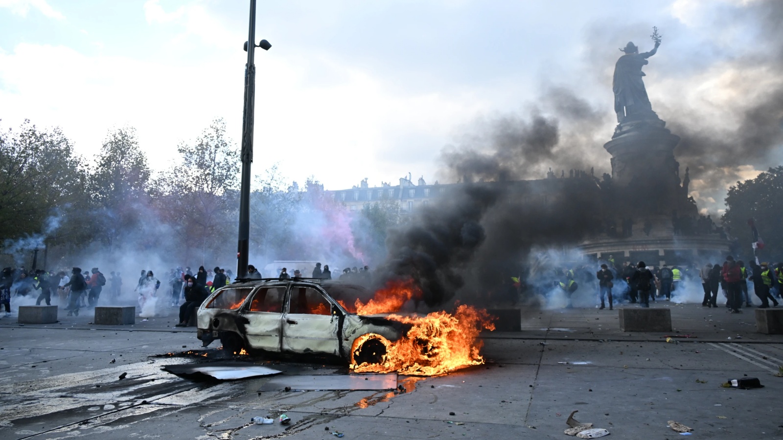 Clashes and fires break out as protesters rally across France, joining students
