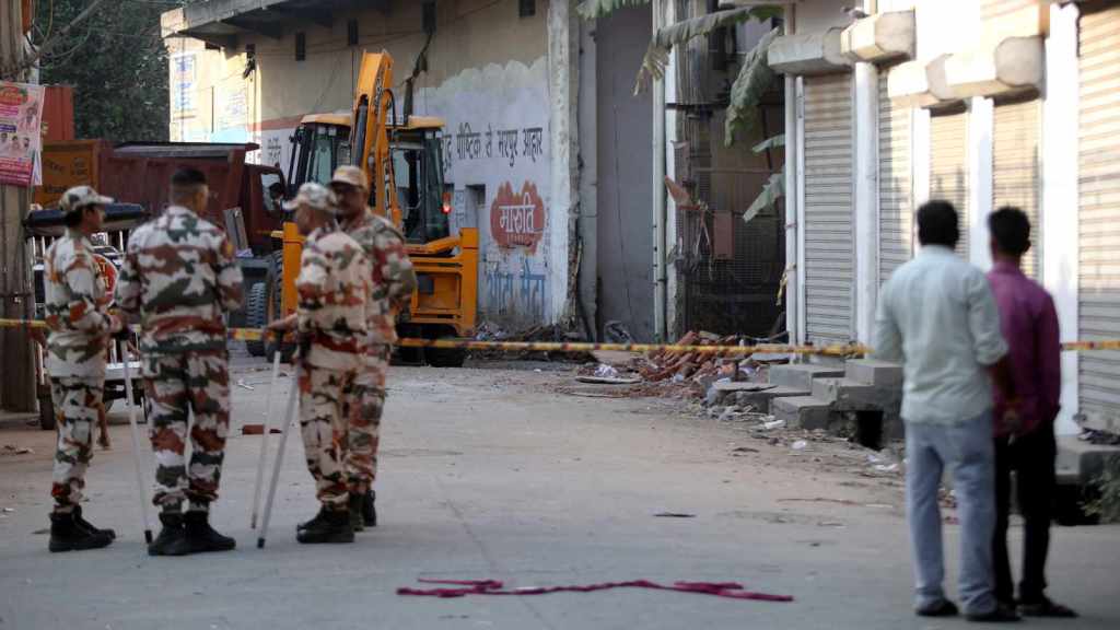 Man, son who took contract for illegal floor die in Delhi building ...