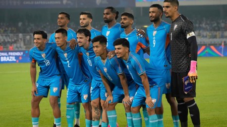 India's players pose for a group photo before the international friendly soccer match against Brazil in Kolkata, India, Saturday, Oct. 3, 2026. (AP Photo/Bikas Das)