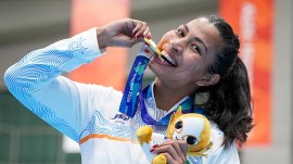 lovlina asian games Lovlina Borgohain poses for photographers during the medal ceremony for the women's 75kg boxing event at the 20th Asian Games, in Nishio, Aichi, Japan, Friday, Oct. 2, 2026. (PTI Photo)
