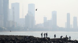 Mumbai's skyline shrouded in haze amid concerns over deteriorating air quality, as temperatures soar across the city.