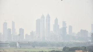 A view of towers remain surrounded by haze as air quality continues to be a concern, in Mumbai on Wednesday. (ANI Photo)